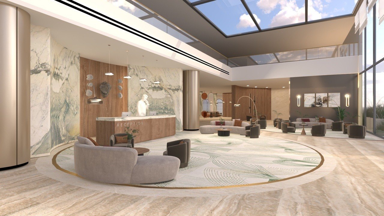 Hotel reception desk under a skylight